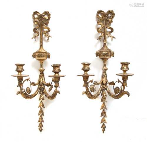 A pair of Continental gilt metal twin-branch candelabra,