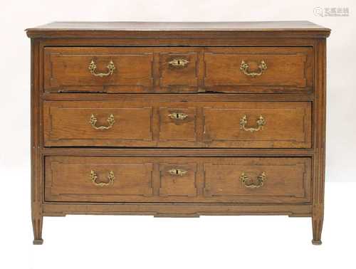 A French oak commode chest,