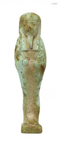 A pale green faience shabti figure,