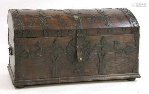 A large oak dome-topped chest,