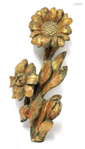 A carved wooden and gilt carving fragment,