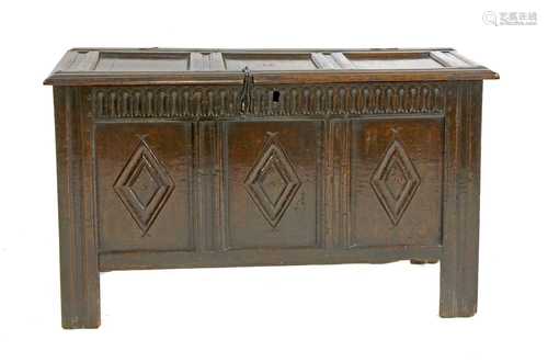 An oak triple-panelled coffer,