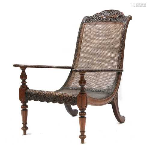 An Anglo-Indian padouk bergère open armchair,