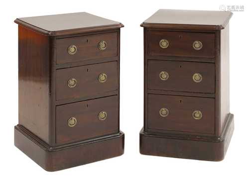 A pair of mahogany bedside pedestals,