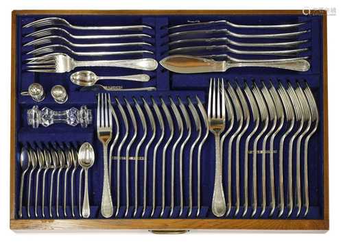 A comprehensive George V silver twelve-setting canteen of cutlery