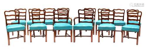 A set of fourteen George II-style mahogany dining chairs,