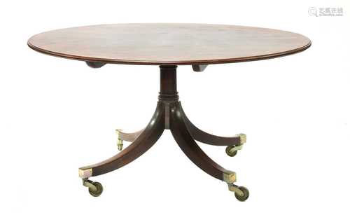 A George III mahogany circular dining table,