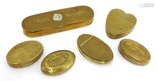 A collection of brass snuff boxes,