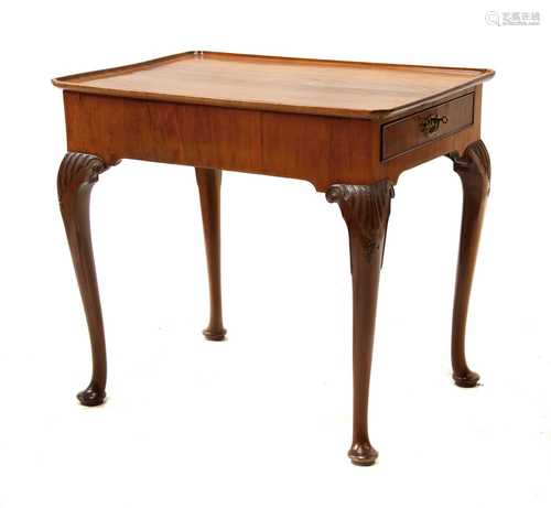 A George III mahogany tray top silver table,