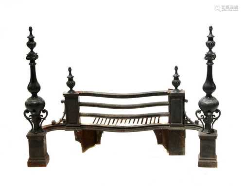 A cast iron and bronze fire grate,