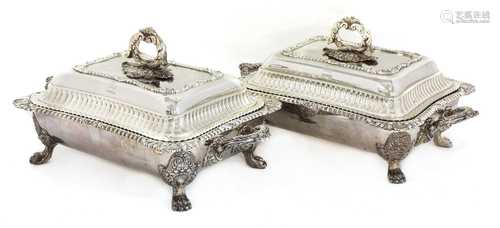 A pair of Georgian silver entrée dishes and covers on heated stands,