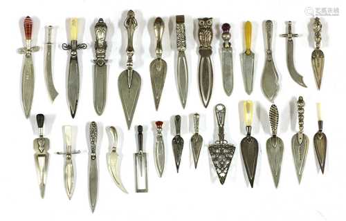 Twenty-six silver trowel and knife bookmarks,