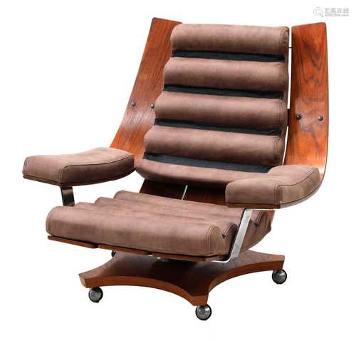 A teak and chrome swivelling 'House Master' armchair,