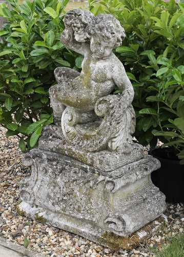 A reconstituted stone cherub,