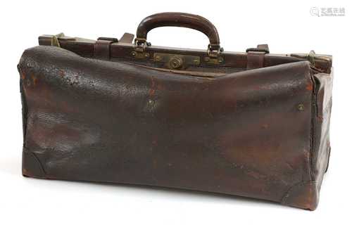 An oxblood leather Gladstone bag,