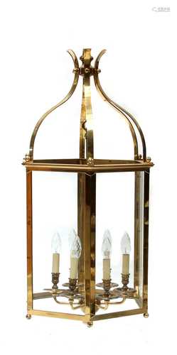 A large brass-framed hexagonal six-light hall lantern,