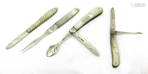 Three silver and mother-of-pearl folding fruit knives and a fork,