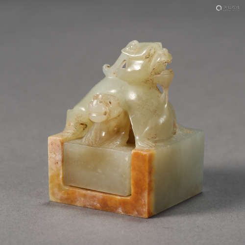 HAN DYNASTY, AN ELABORATE SEAL AND ITS STANDING MADE OF HETIAN JADE