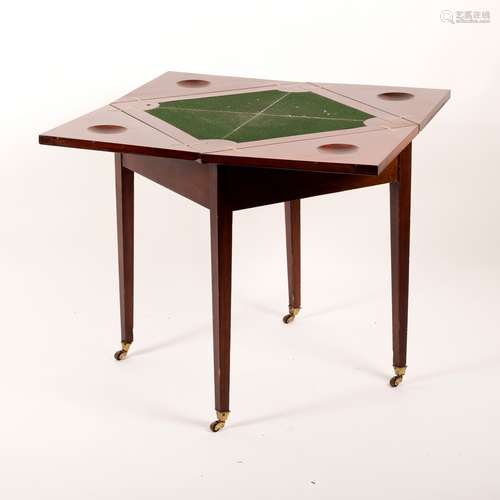 An Edwardian mahogany envelope card table,