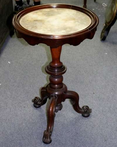 A Victorian marble top tripod table,
