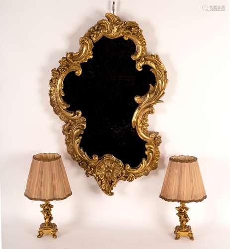 A Rococo style gilt framed mirror,