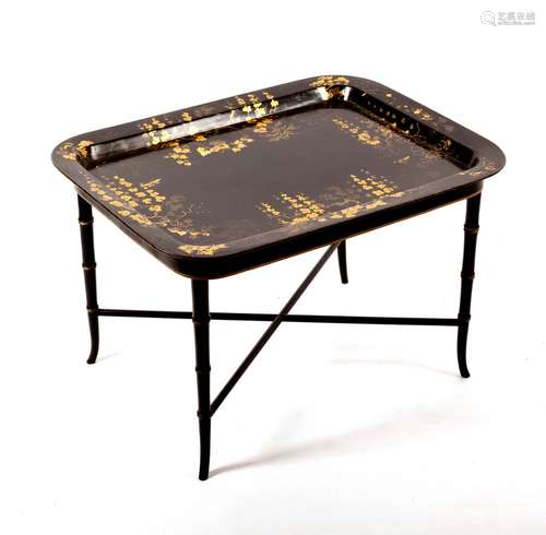 A black lacquered papier-mâché tray on faux bamboo stand, tray 75.