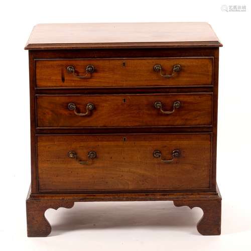 A George III mahogany chest of three drawers on bracket feet, 68.