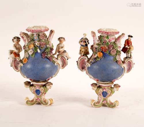 A pair of Meissen vases, circa 1860, modelled as two of the Four Seasons, with figural handles,