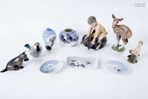 A collection of Royal Copenhagen including Faun with Bear (648), Scottie dog (3162),