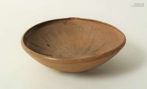 A Changsha shallow pouring bowl, 10th Century, the interior with combed decoration, 16.