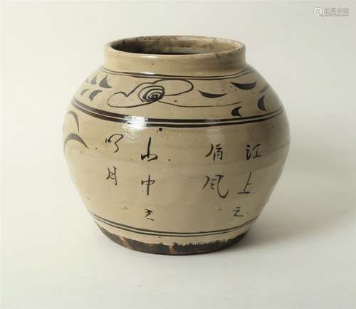 A Chinese Cizhou type jar, Yuan dynasty, decorated flowers and script in brown on oatmeal glaze, 19.