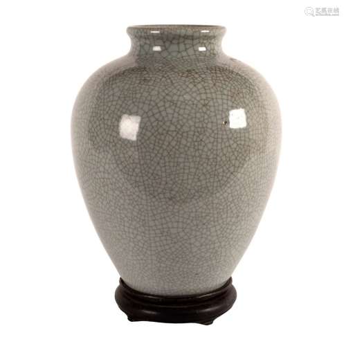 A Chinese crackle glazed celadon vase of ovoid form, Qianlong seal mark but of a later period,