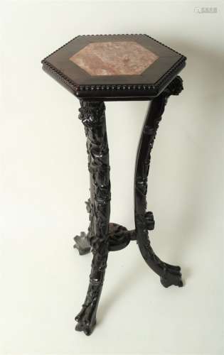 A Chinese 19th Century hardwood jardinière stand with inset marble top (hexagonal with concave
