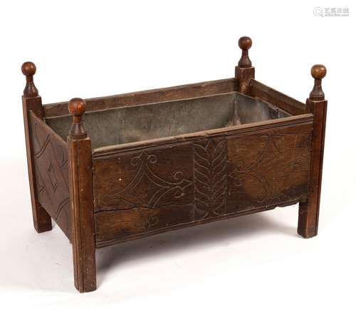 A carved oak log box, part 17th Century, 81.