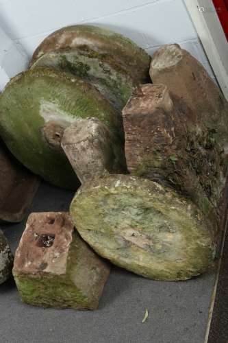 Four staddle stones with tops, the largest approximately 78cm high,