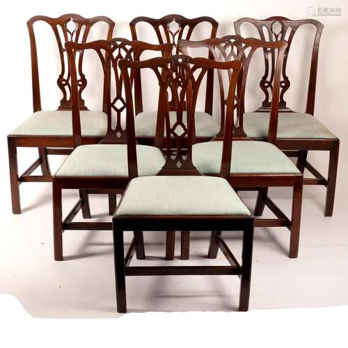 A harlequin set of six 19th Century mahogany dining chairs with pierced splats,