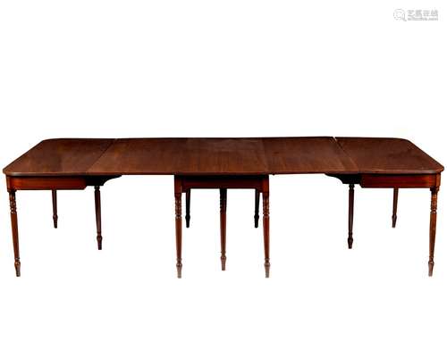 A Regency mahogany dining table on turned tapering legs, fitted three leaves, 281cm x 135.