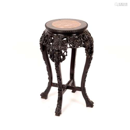A Chinese carved hardwood vase stand, 63.