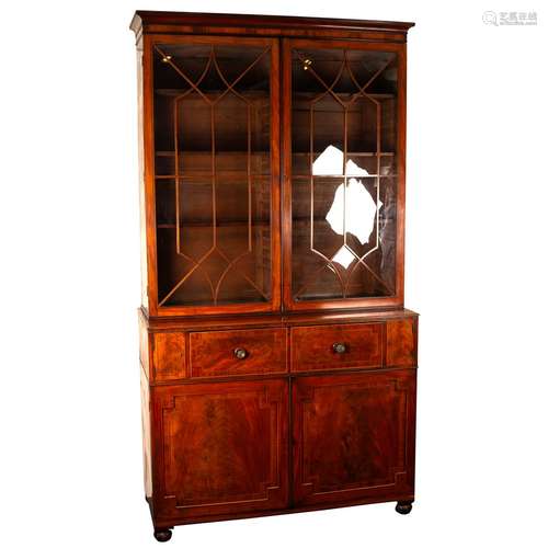 A large George IV mahogany and inlaid secretaire bookcase,