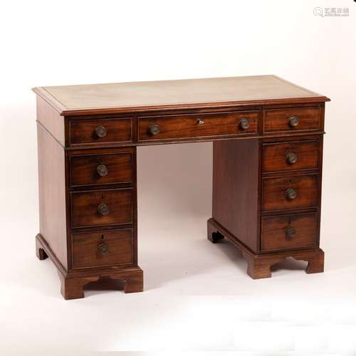 A mahogany pedestal desk,