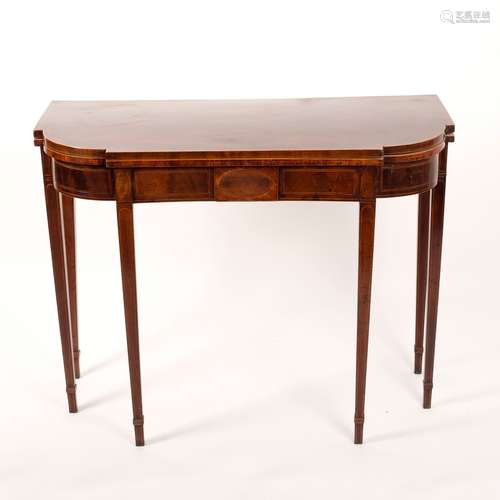 A George III mahogany fold over card table, inlaid boxwood lines, on square taper legs,