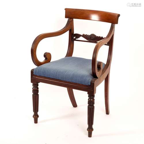 A William IV mahogany open armchair on reeded front legs