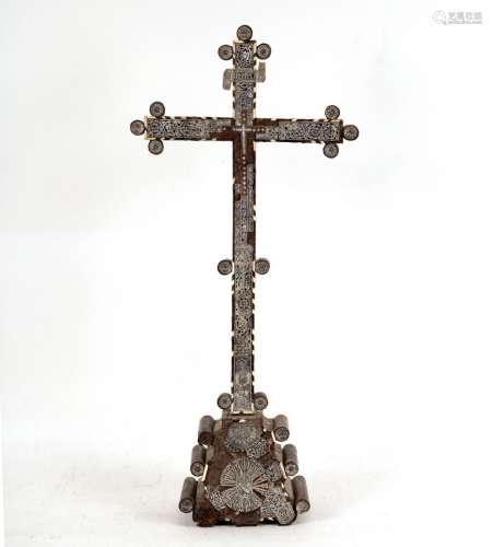 A 19th Century Italian ebonised cross, set with engraved shell, 71.