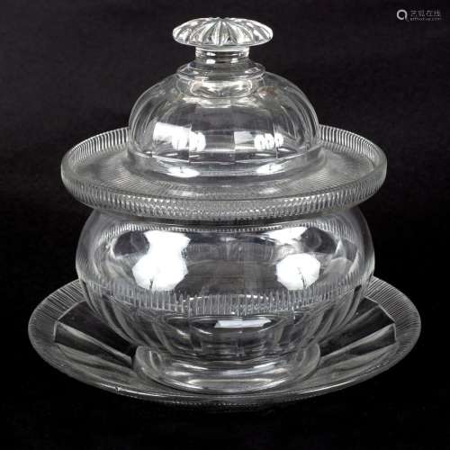 A Georgian cut glass jam or honey pot, cover and stand with reeded panelled decoration,