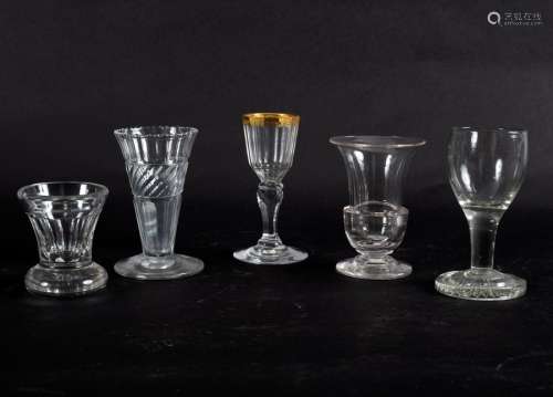 A 19th Century Continental drinking glass with painted gilt band decoration and other glasses