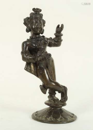 An Indian bronze figure, Krishna dancing, possibly 18th Century, 23.