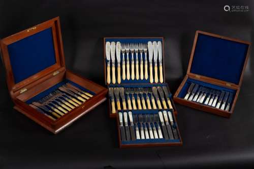 Eighteen pairs of fish knives and forks, cased, twelve pairs of dessert knives and forks,
