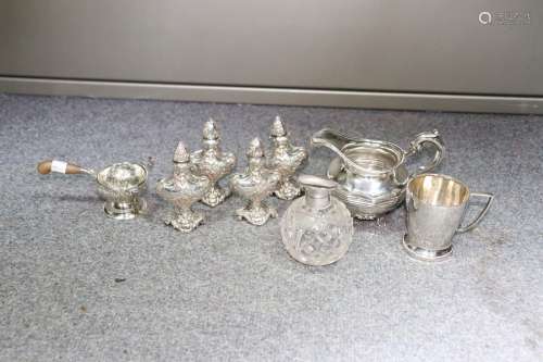 Four silver pepper pots, Birmingham import marks 1900, embossed shepherdess and sheep,