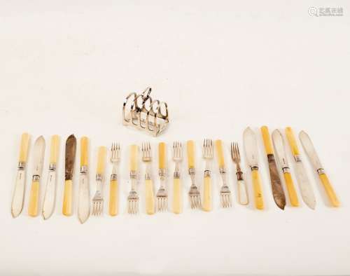 Nine pairs of fish knives and forks with silver blades and ivory handles and a silver five-bar