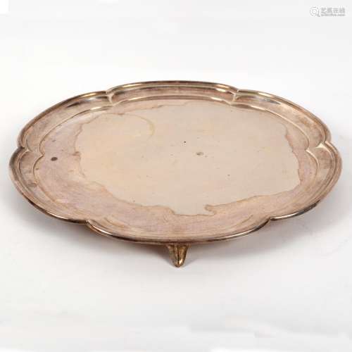 A silver lobed shaped salver, HA, Sheffield 1945, on three outswept feet, 31cm wide,